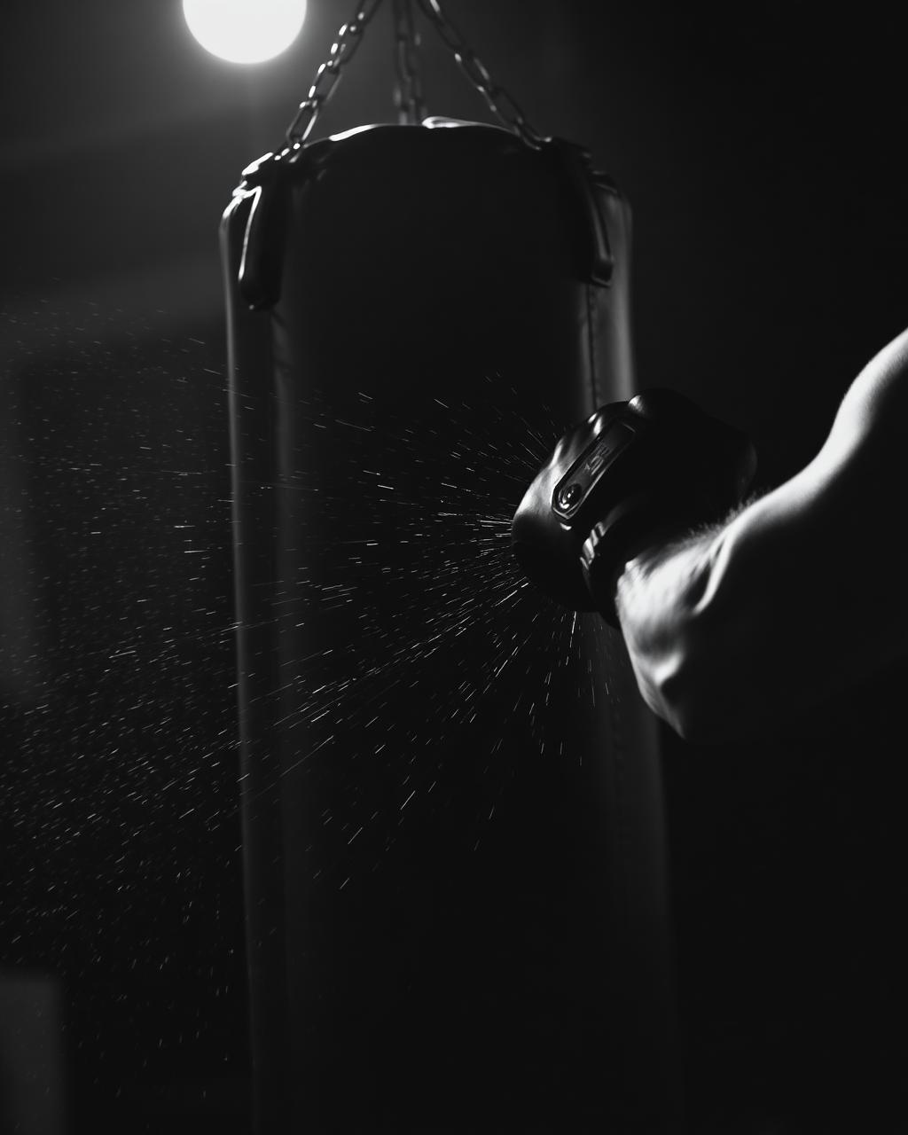 Heavy bag being struck during bag work